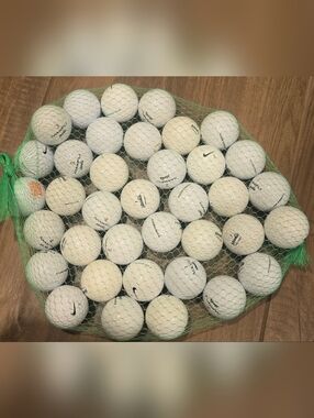 38 Maxfli Noodle white golf balls.